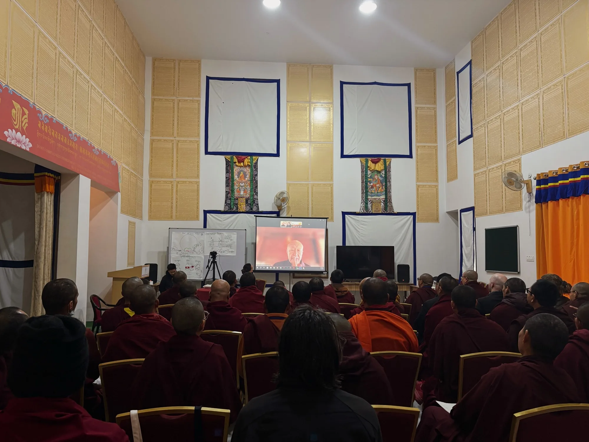 Dzongsar Khyentse Rinpoche speaking to participants via Zoom
